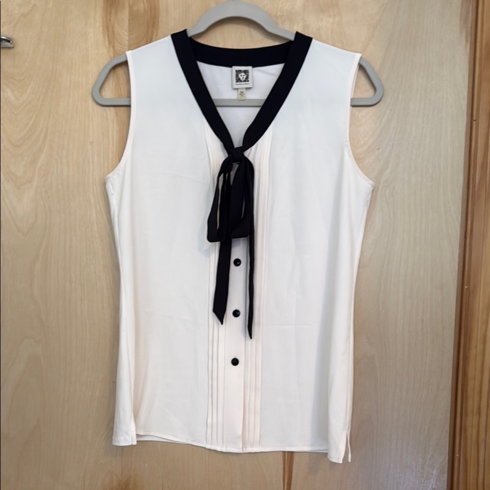 Sleeveless White Tie-Neck Top with Black Trim